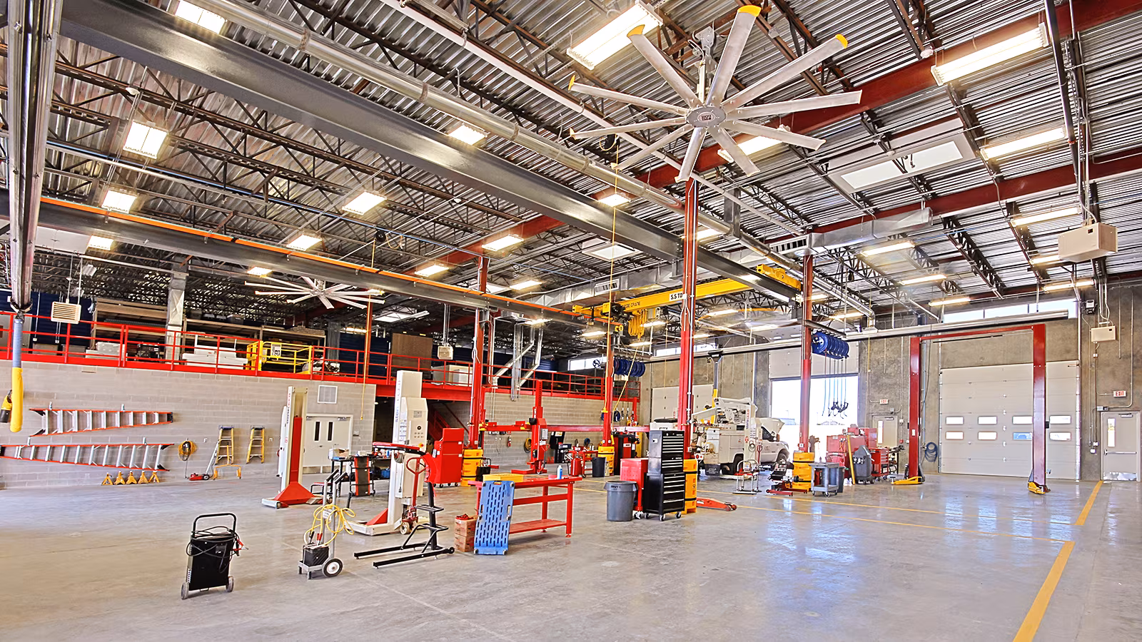 Fleet maintenance facility with service bays and heavy-duty circulation